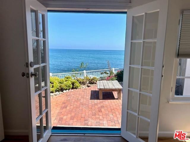 a view of a living room with a fireplace