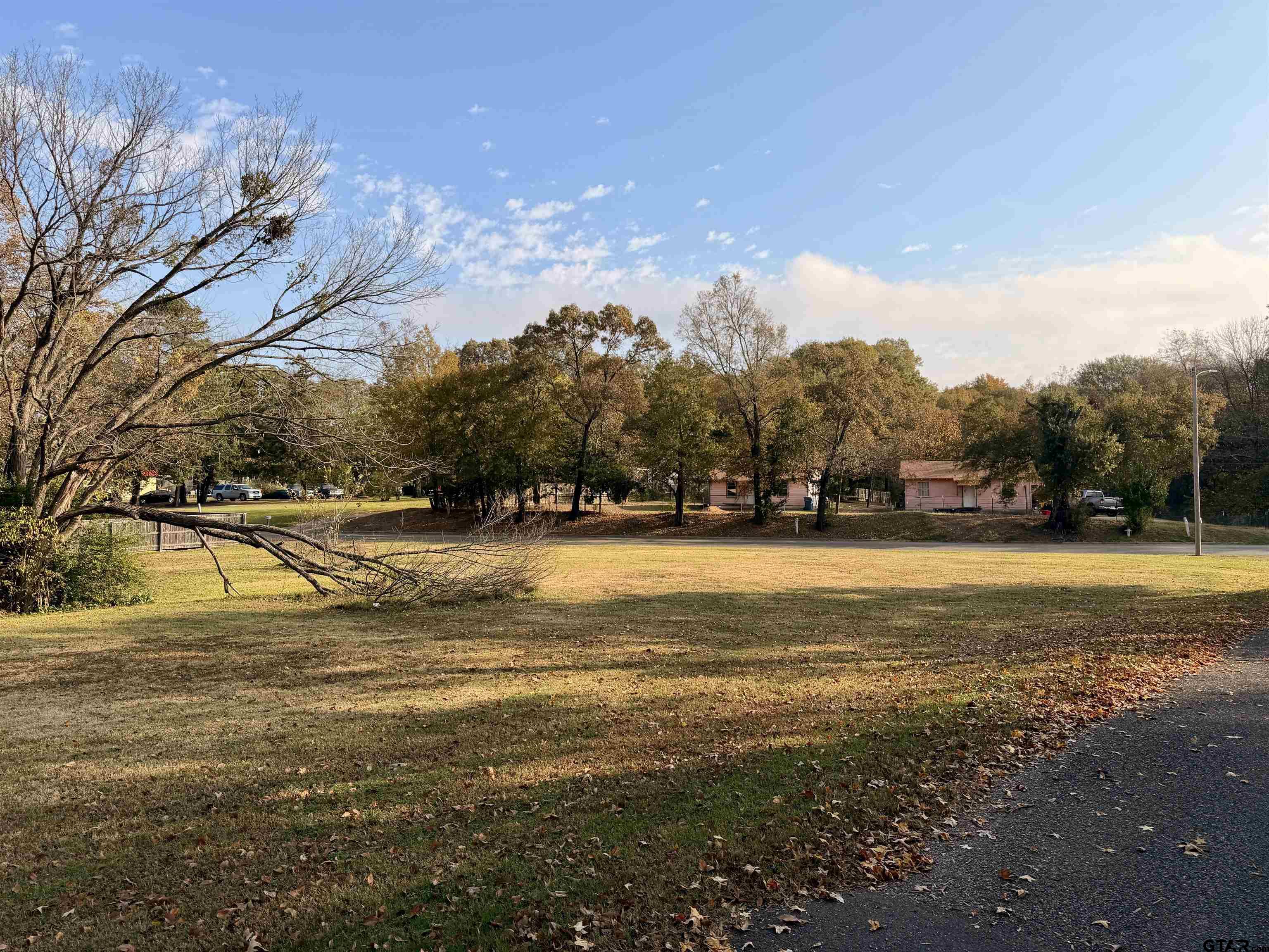 Tbd East Arkansas Street Mount Pleasant, TX 75455 - Photo 3 of 3 a view of yard with swimming pool and trees