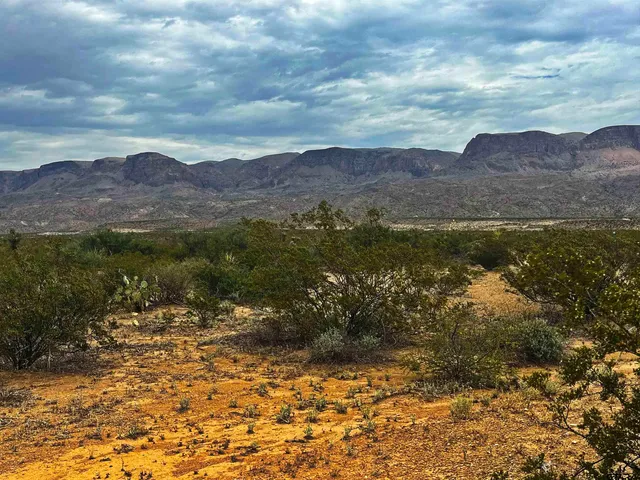 a view of lake with mountain