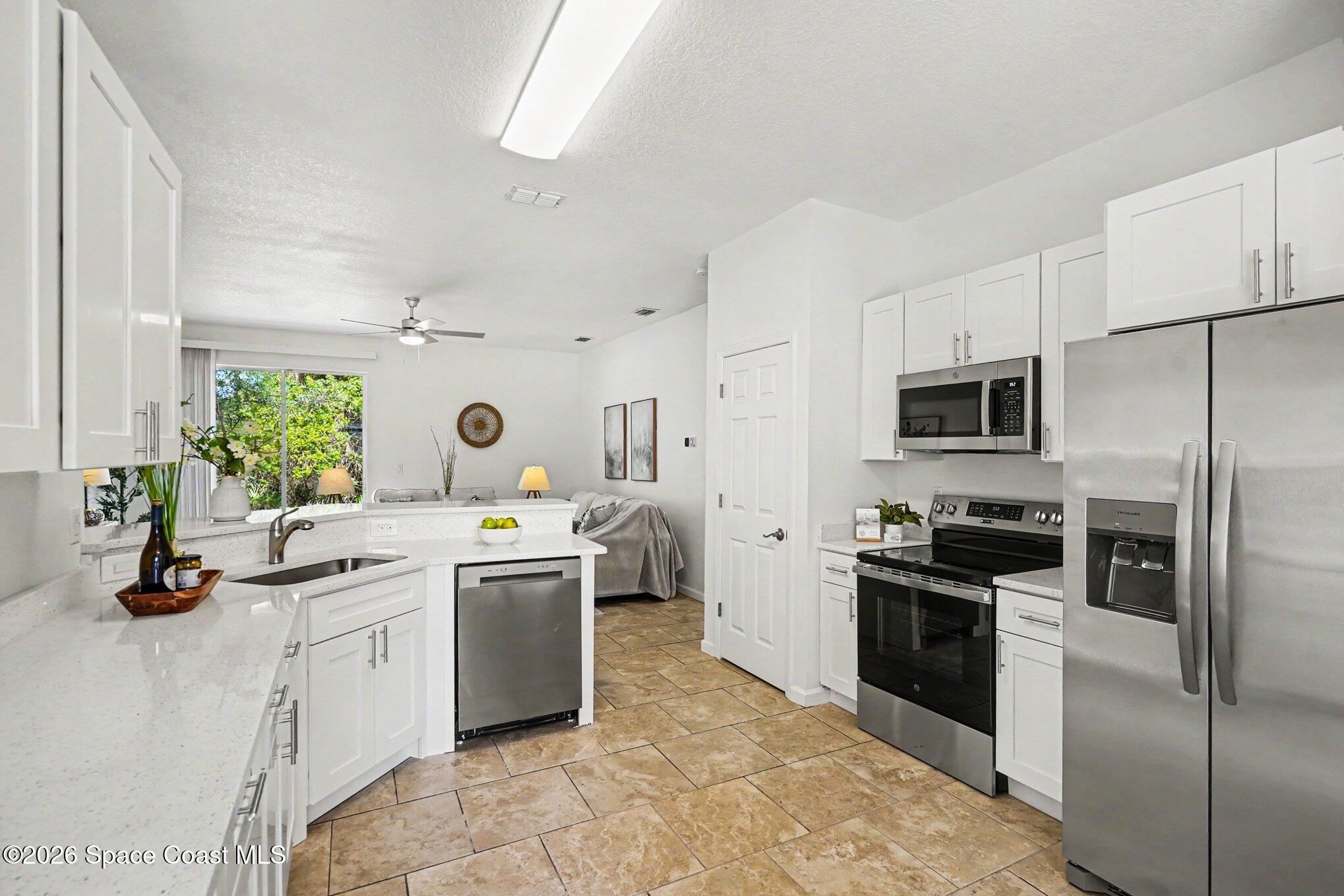 191 Turk Road Southwest Palm Bay, FL 32908 - Photo 2 of 21 All new Kitchen