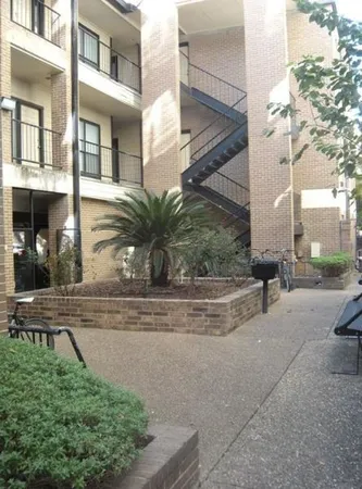 a view of a house with a street