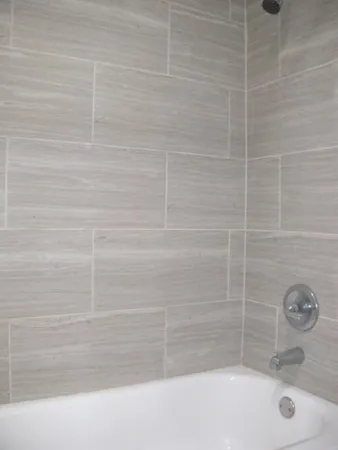 a bathroom with a bathtub