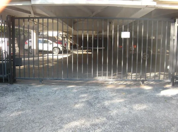 a view of outdoor space with wooden floor