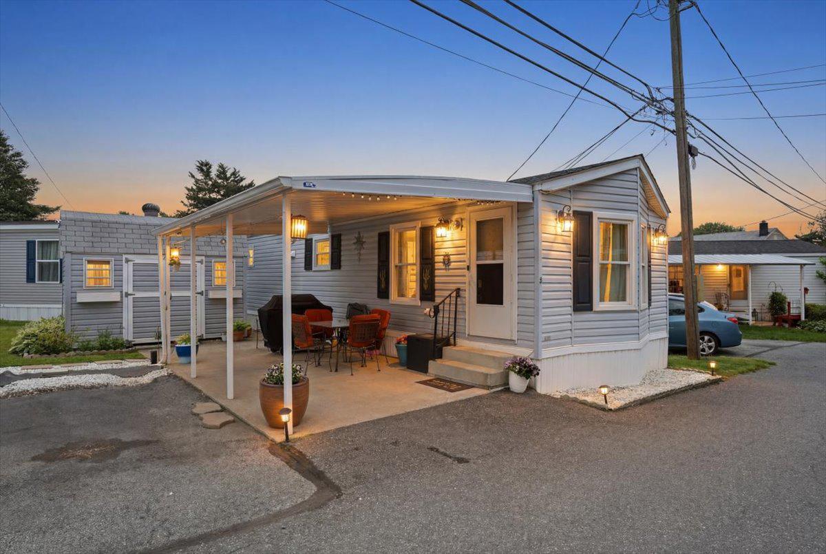 3350 Airport Road, Unit 5 Allentown, PA 18109 - Photo 1 of 53 Charming home with inviting porch glow.