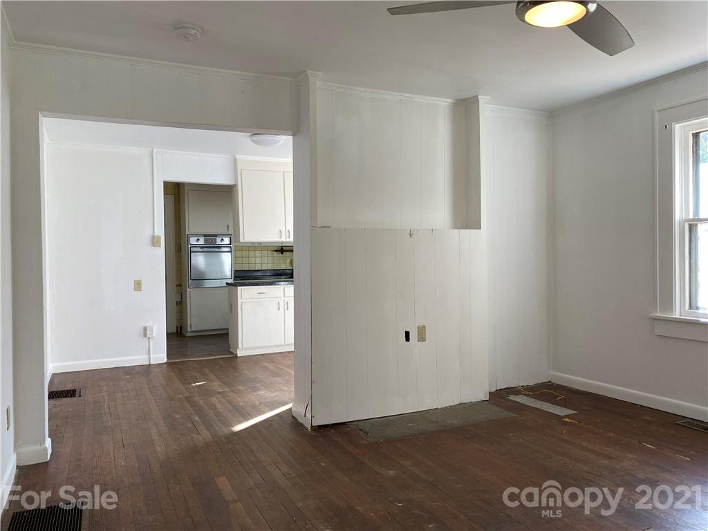 1 Sycamore Street Asheville, NC 28804 - Photo 11 of 46 a view of empty room with wooden floor