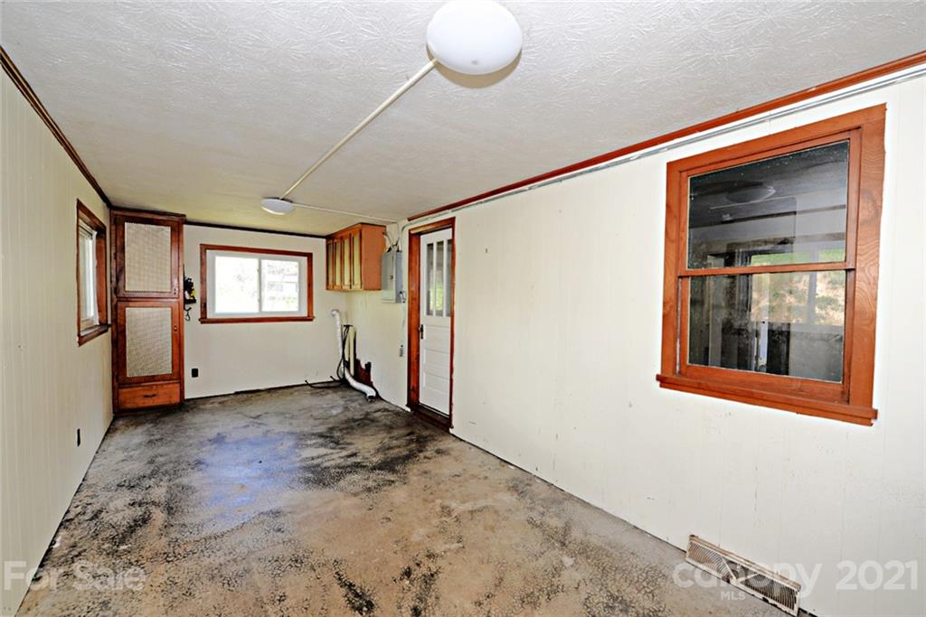 1 Sycamore Street Asheville, NC 28804 - Photo 25 of 46 a view of empty room with windows