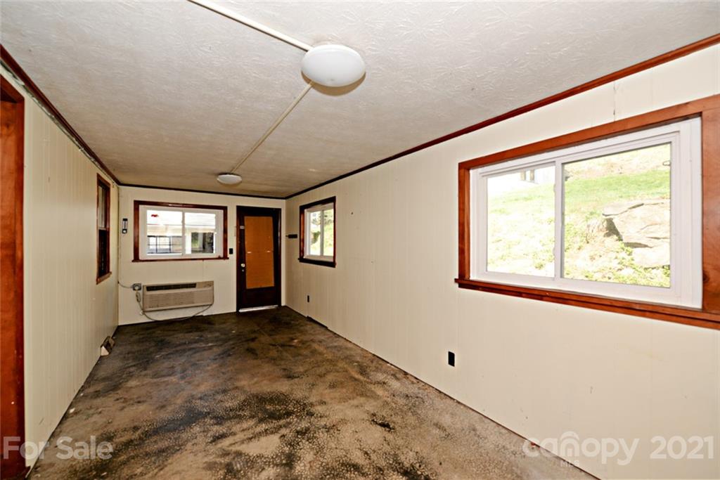 1 Sycamore Street Asheville, NC 28804 - Photo 26 of 46 a view of an empty room with a window