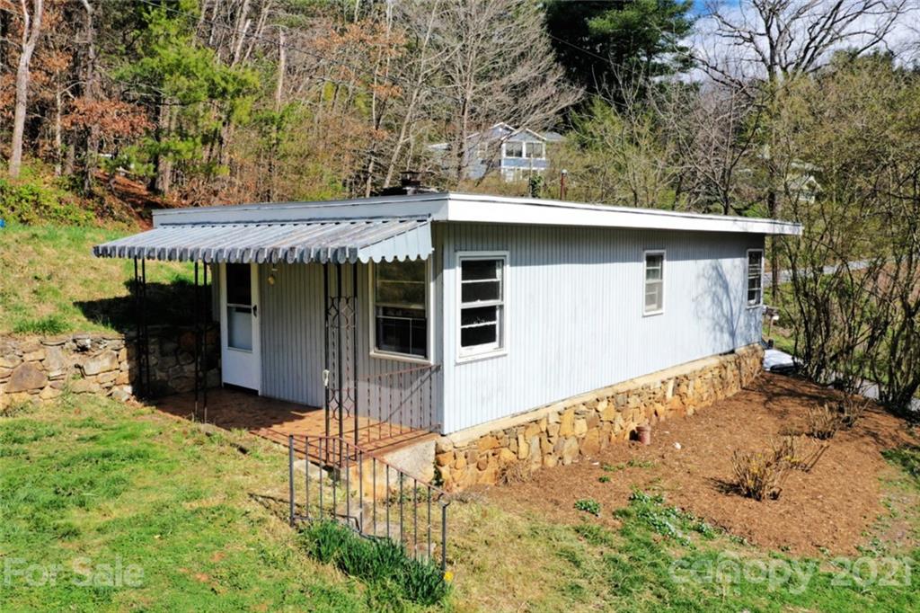 1 Sycamore Street Asheville, NC 28804 - Photo 27 of 46 a view of a house with a yard