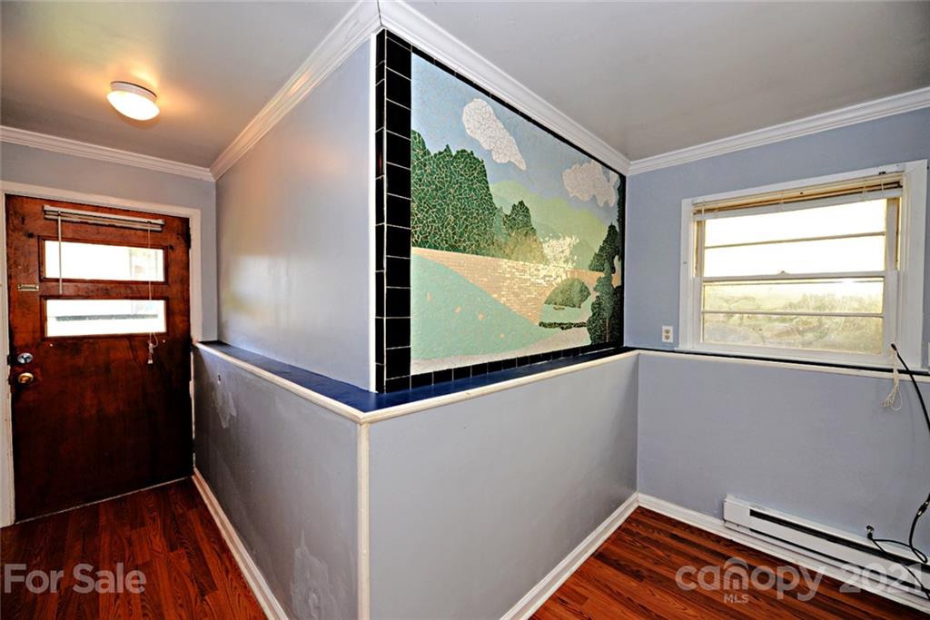 1 Sycamore Street Asheville, NC 28804 - Photo 30 of 46 a view of hallway with window