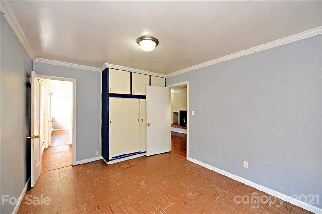 1 Sycamore Street Asheville, NC 28804 - Photo 35 of 46 an empty room with closet and windows