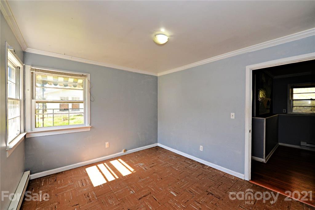1 Sycamore Street Asheville, NC 28804 - Photo 37 of 46 a view of an empty room and window