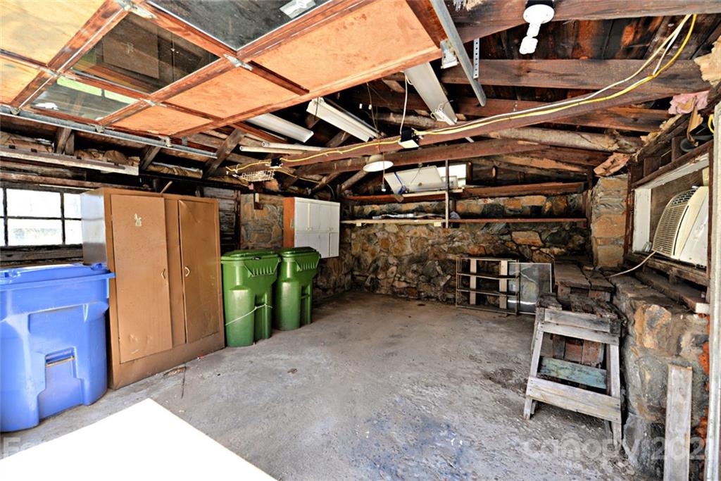 1 Sycamore Street Asheville, NC 28804 - Photo 40 of 46 a view of a room with gym equipment