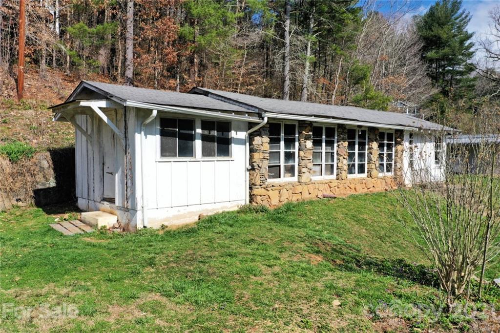 1 Sycamore Street Asheville, NC 28804 - Photo 41 of 46 a view of a house with a yard