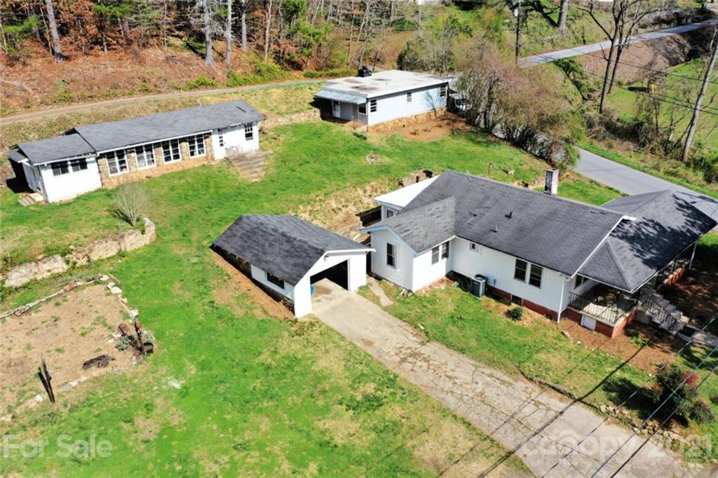 1 Sycamore Street Asheville, NC 28804 - Photo 45 of 46 an aerial view of multiple houses with yard