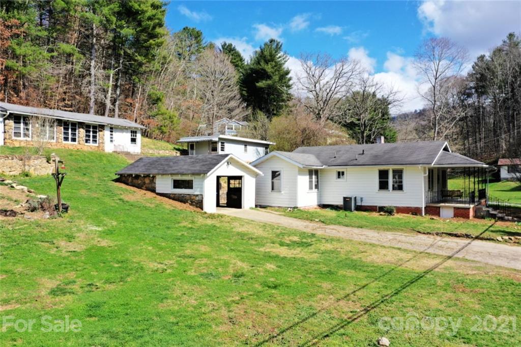 1 Sycamore Street Asheville, NC 28804 - Photo 8 of 46 a front view of a house with a yard