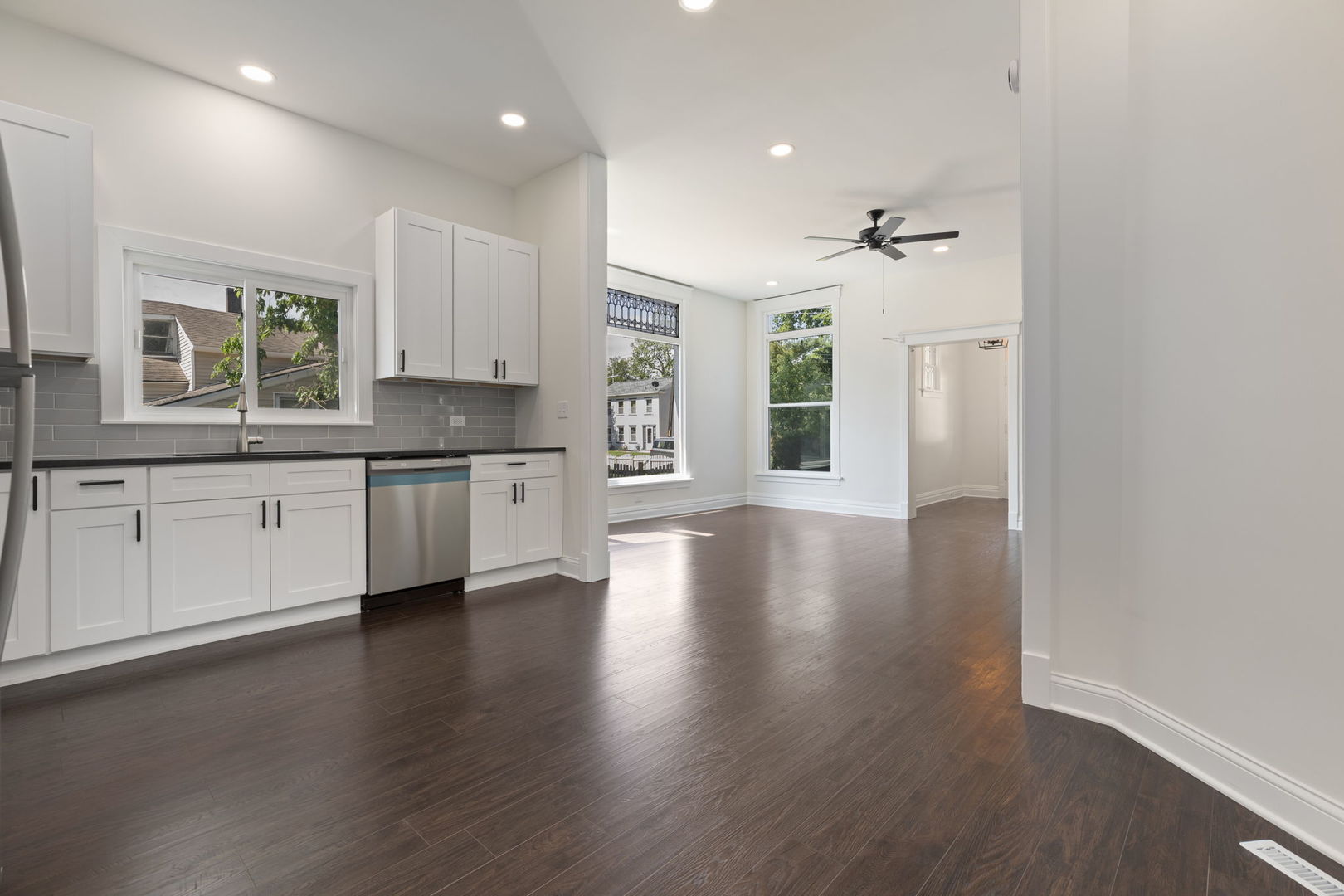 718 Sycamore Street Ottawa, IL 61350 - Photo 11 of 27 a view of a kitchen with a sink cabinets and wooden floor