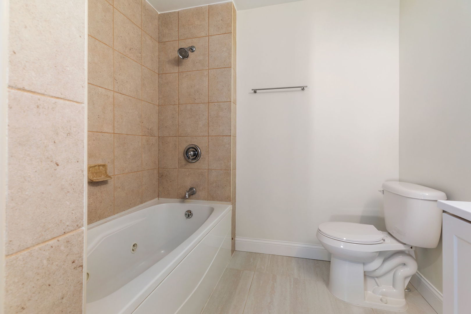 718 Sycamore Street Ottawa, IL 61350 - Photo 15 of 27 a white bath tub sitting next to a toilet