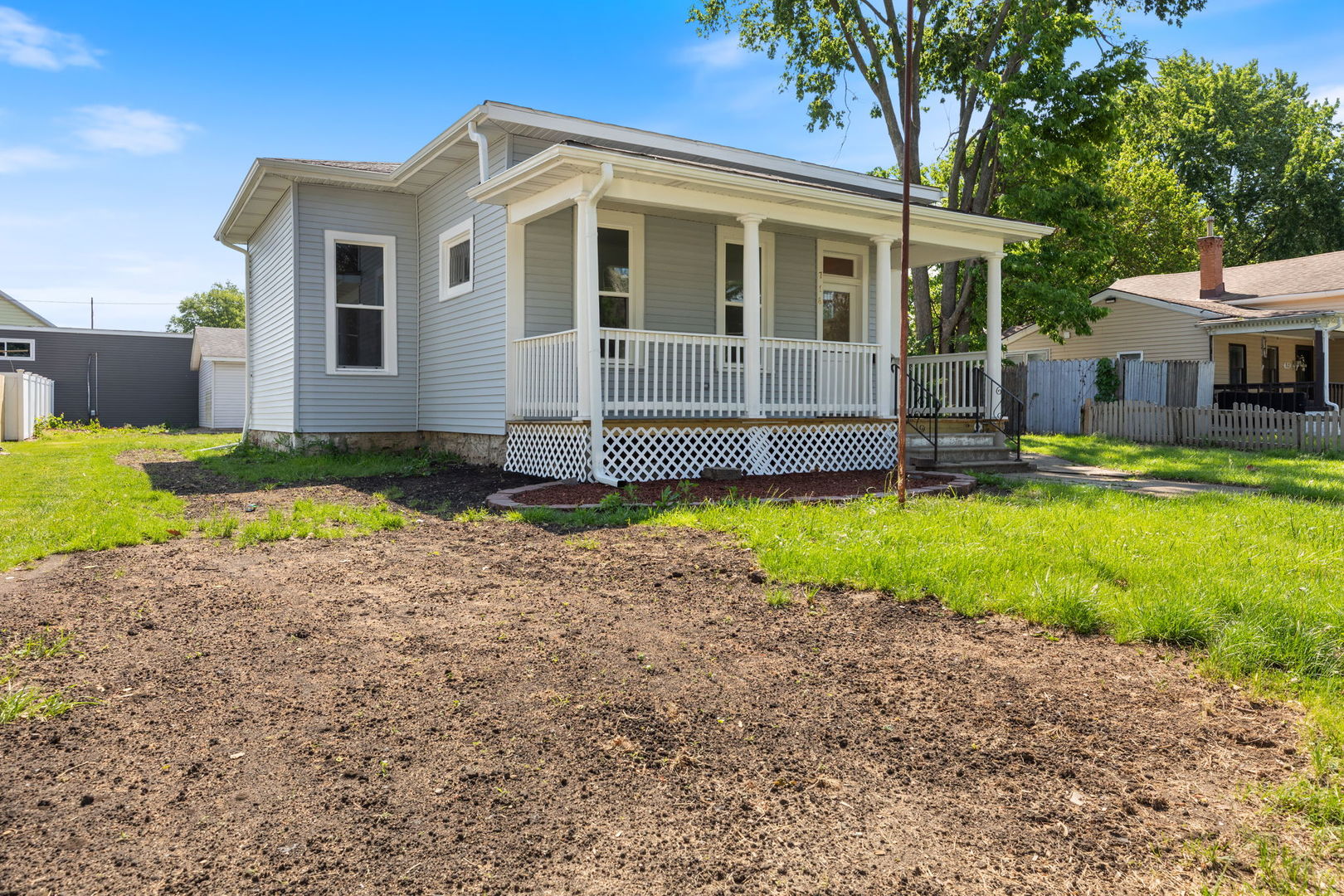 718 Sycamore Street Ottawa, IL 61350 - Photo 2 of 27 a view of a house with a swimming pool