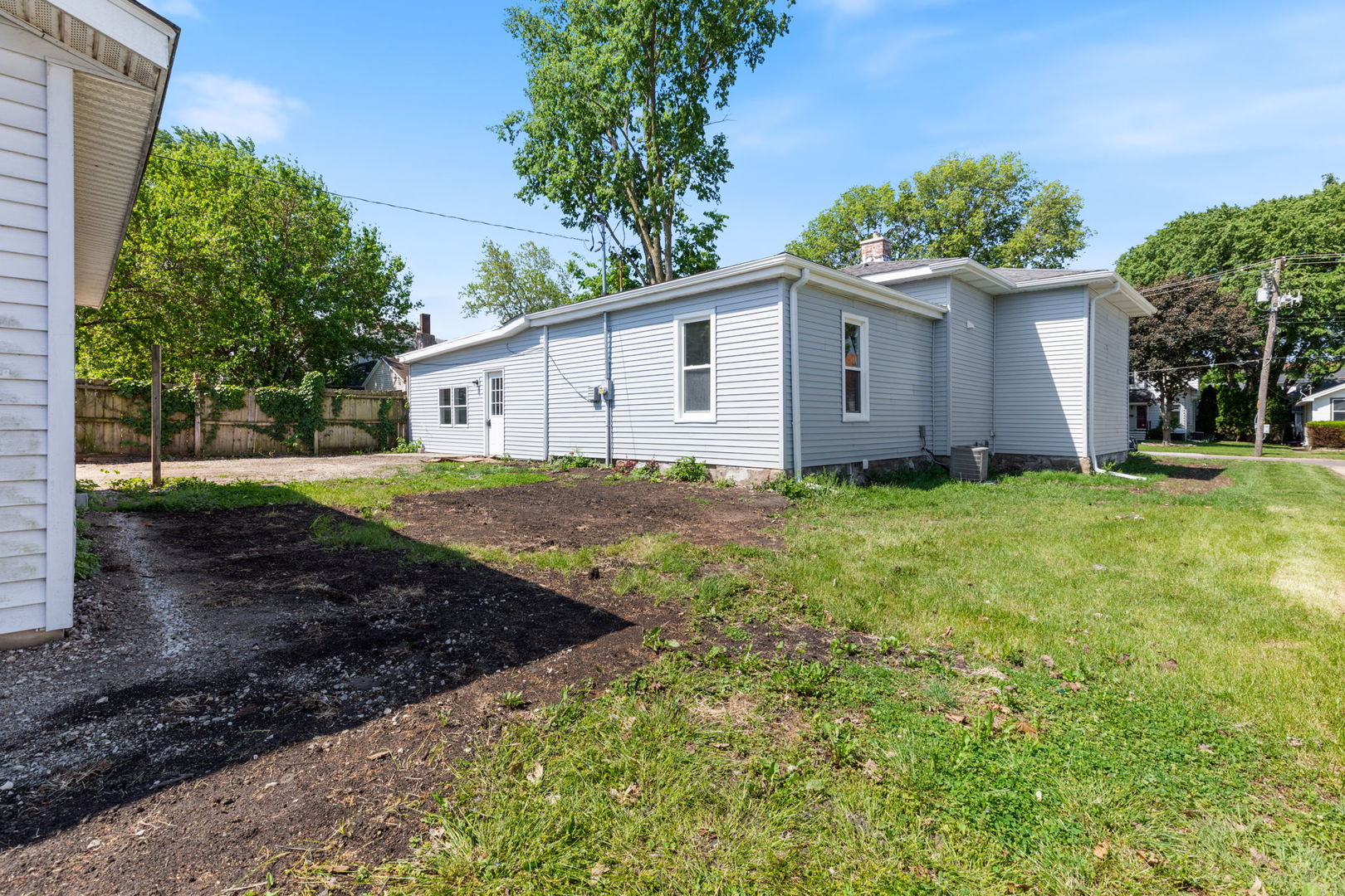 718 Sycamore Street Ottawa, IL 61350 - Photo 26 of 27 a view of a house with a yard