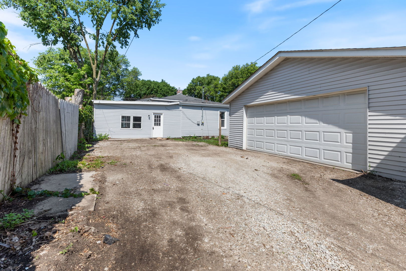 718 Sycamore Street Ottawa, IL 61350 - Photo 27 of 27 a backyard of a house with yard and garage