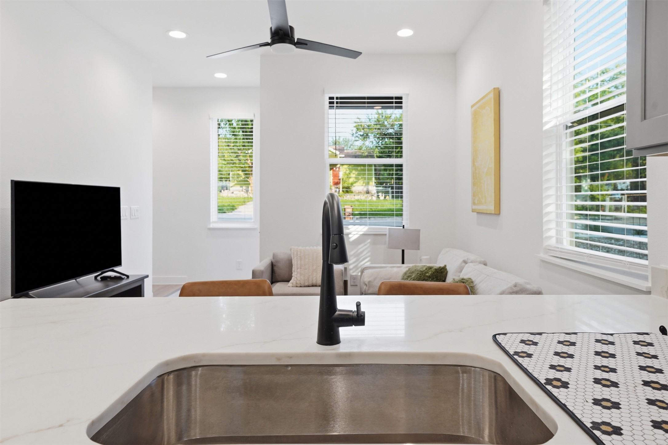 2216 Yellow Jacket Lane, Unit 2 Austin, TX 78741 - Photo 11 of 25 a kitchen with a sink and a window
