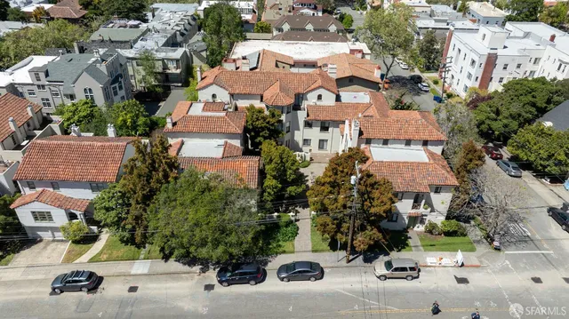 an aerial view of a houses with yard