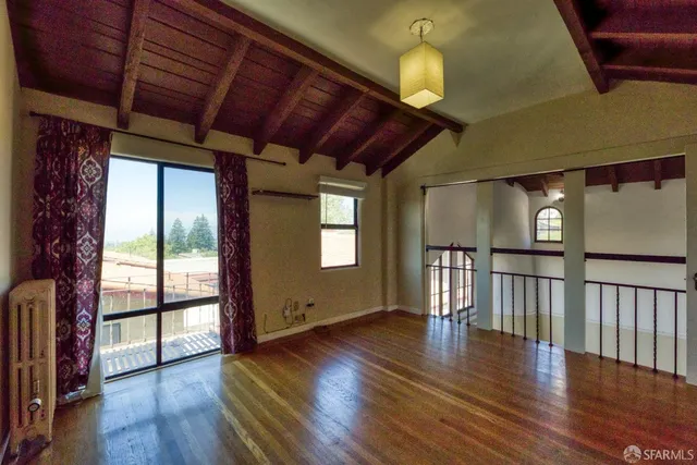 a bedroom with bed and window