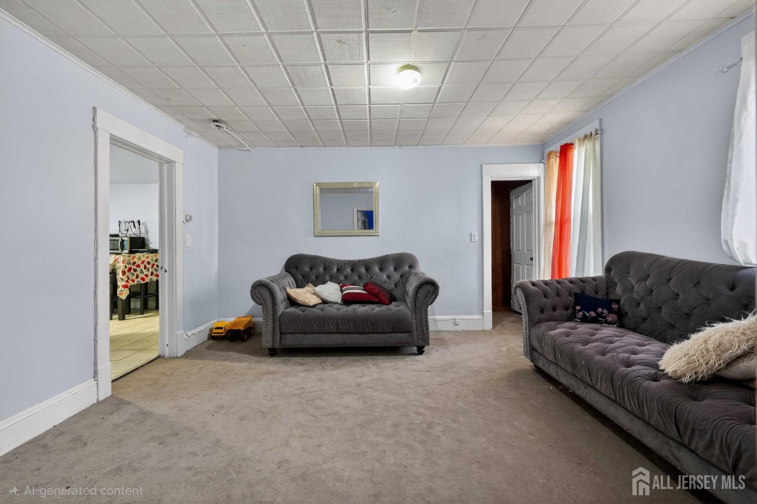 361 Prospect Street Perth Amboy, NJ 08861 - Photo 14 of 50 a living room with furniture and a couch