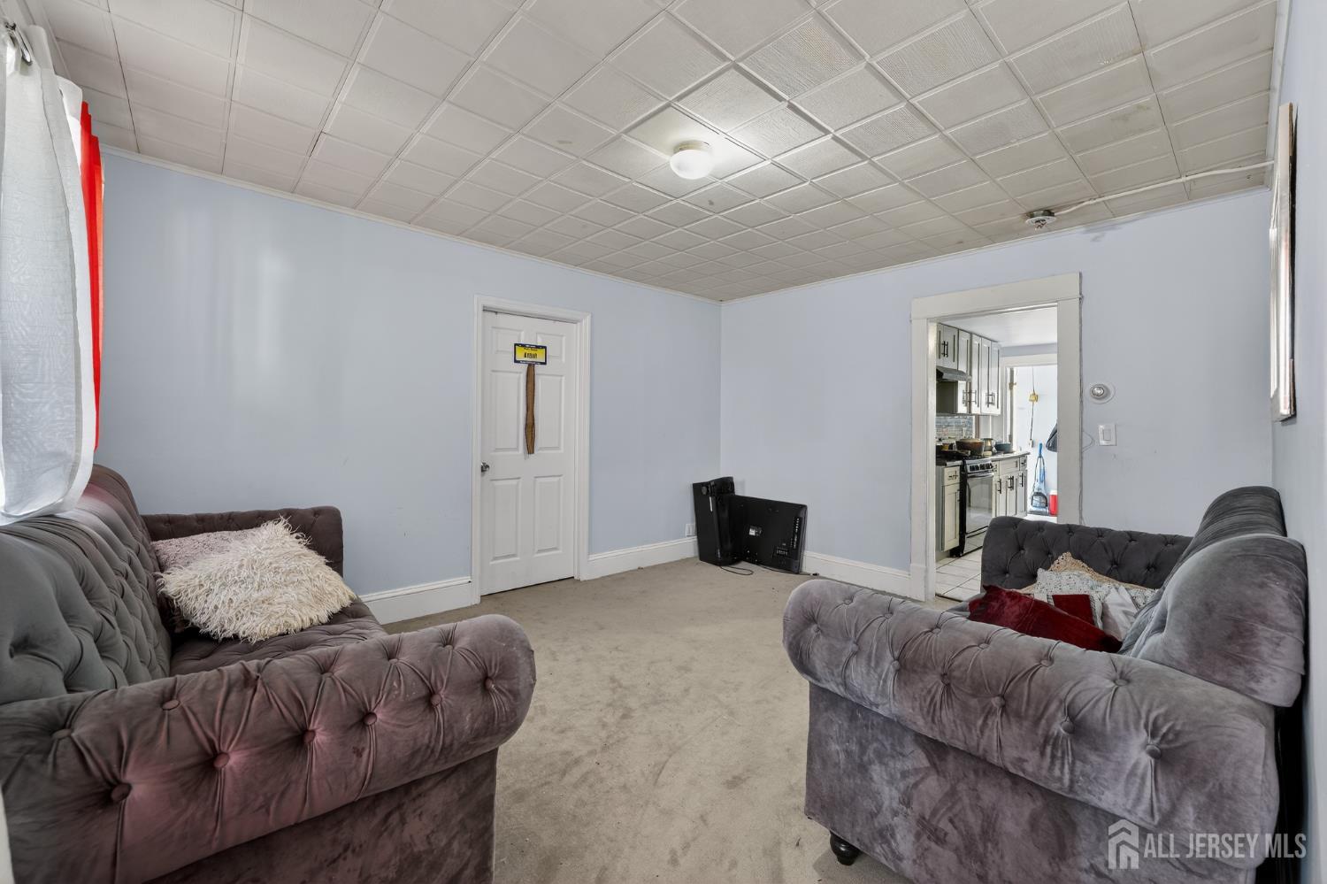 361 Prospect Street Perth Amboy, NJ 08861 - Photo 15 of 50 a living room with furniture and a couch