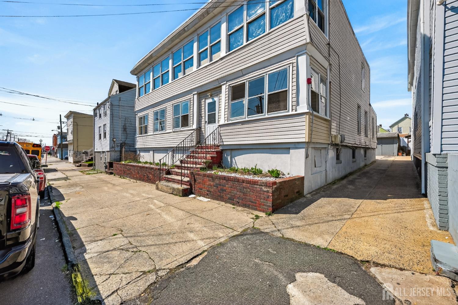 361 Prospect Street Perth Amboy, NJ 08861 - Photo 43 of 50 a view of a building with many windows