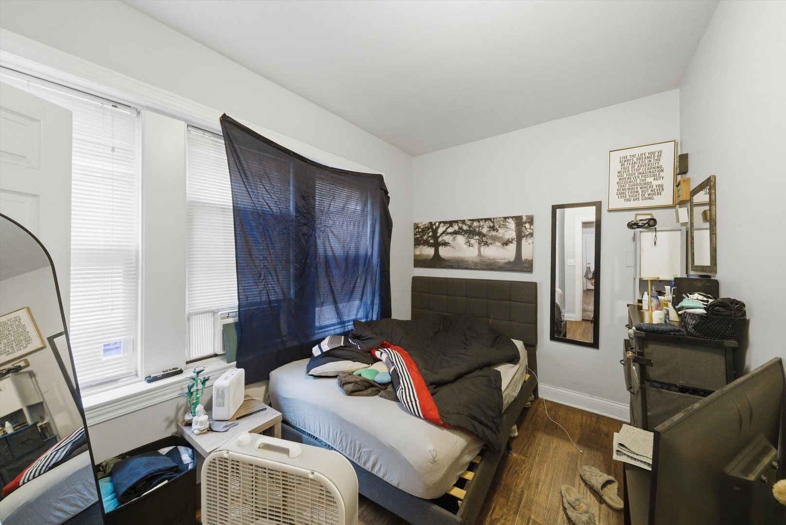 6837 South Morgan Street Chicago, IL 60621 - Photo 8 of 24 a living room with furniture and a flat screen tv