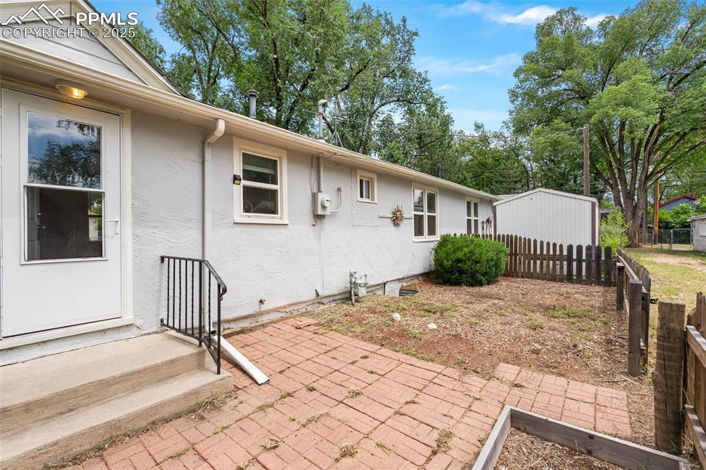 317 West Harrison Street Colorado Springs, CO 80907 - Photo 12 of 22 Fenced in backyards for each unit; 2 units have sheds