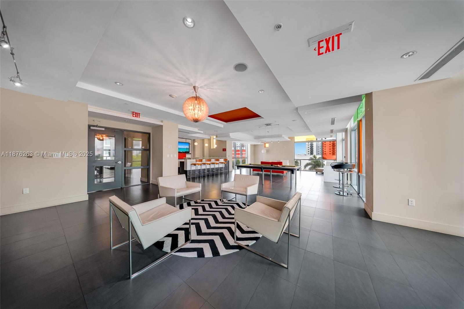 333 Northeast 24th Street, Unit 1111 Miami, FL 33137 - Photo 30 of 39 a living room with furniture and a large window