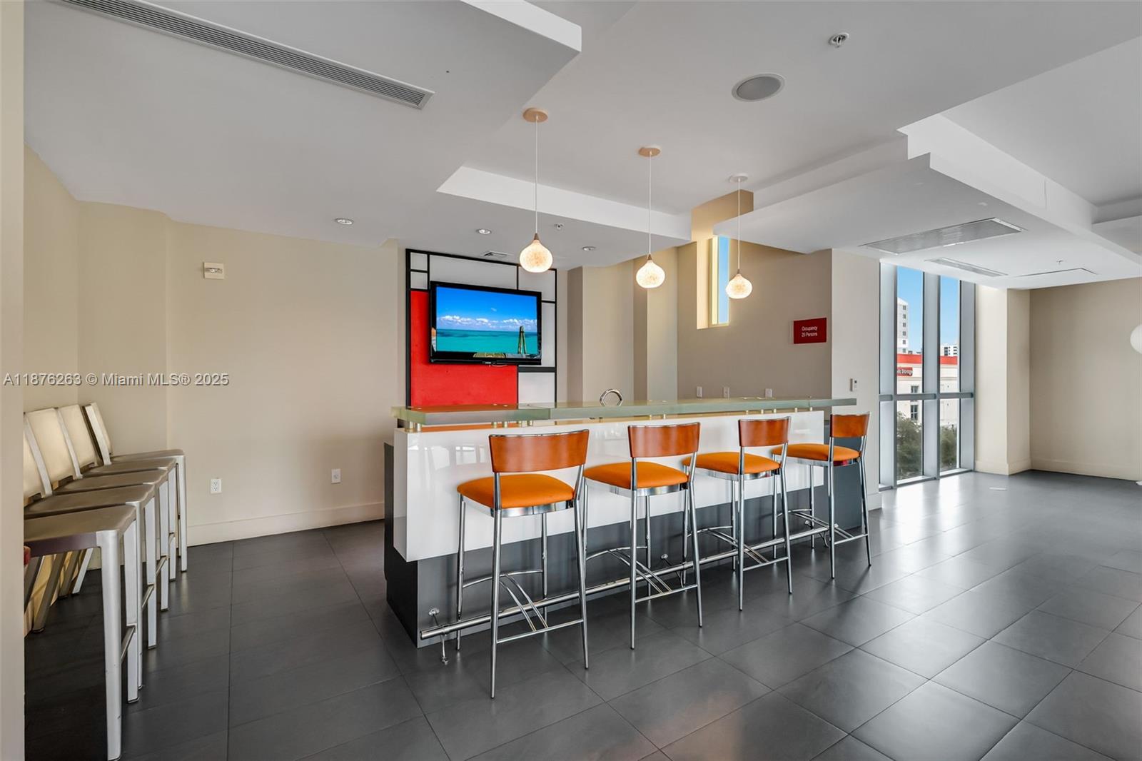 333 Northeast 24th Street, Unit 1111 Miami, FL 33137 - Photo 33 of 39 a view of a room with furniture and wooden floor
