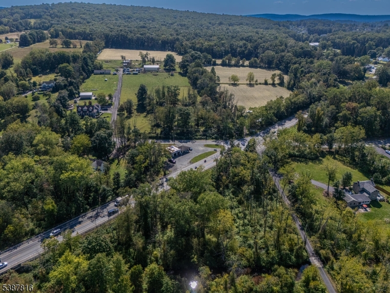 305 Rt 31 Oxford, NJ 07863 - Photo 4 of 16 an aerial view of a house with a yard and outdoor seating
