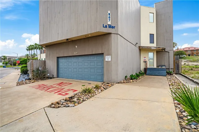 a view of an empty room and fire place