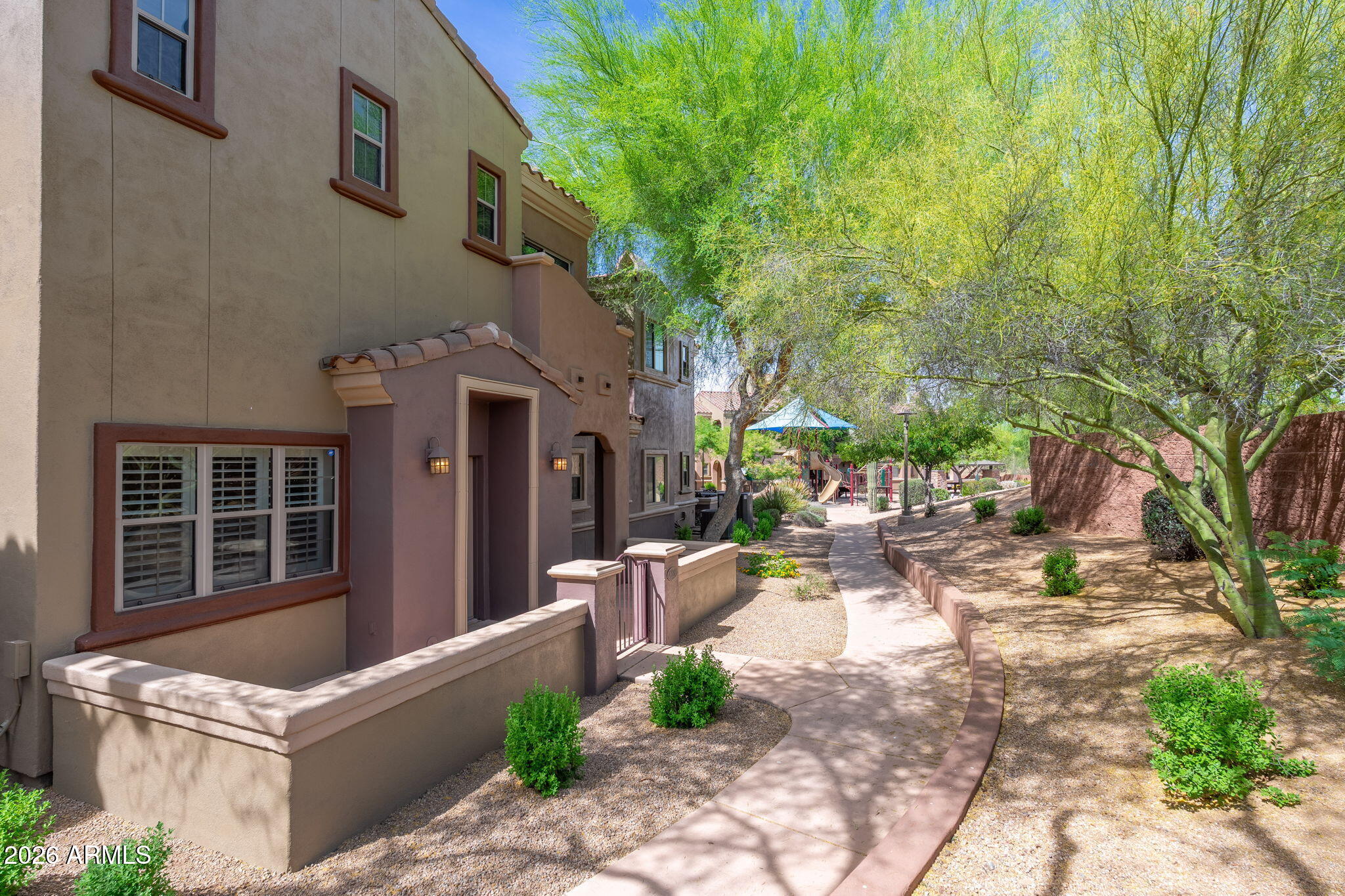 3935 East Rough Rider Road, Unit 1020 Phoenix, AZ 85050 - Photo 2 of 16 Charming Walking Paths