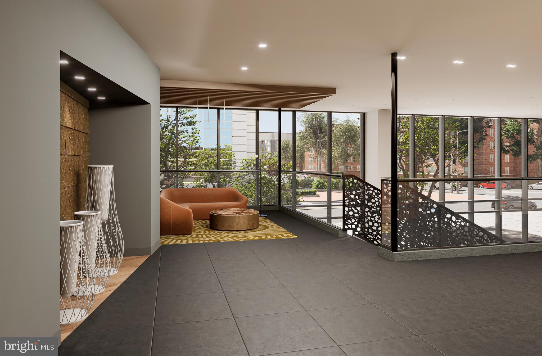 4000 Wisconsin Avenue Northwest, Unit 1B4K252 Washington, DC 20016 - Photo 4 of 50 a lobby with furniture and floor to ceiling window