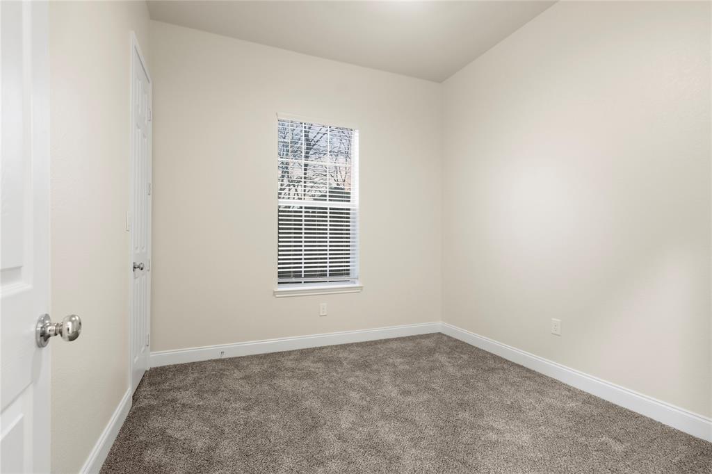503 South 5th Street Bonham, TX 75418 - Photo 12 of 22 an empty room with a window
