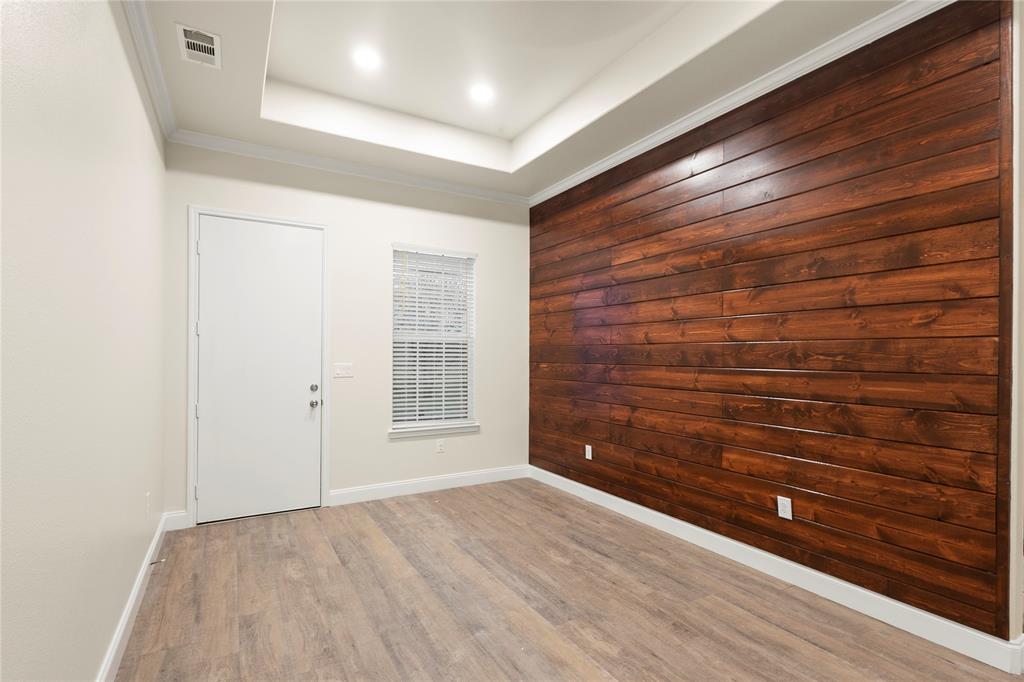 503 South 5th Street Bonham, TX 75418 - Photo 3 of 22 a view of empty room with wooden floor
