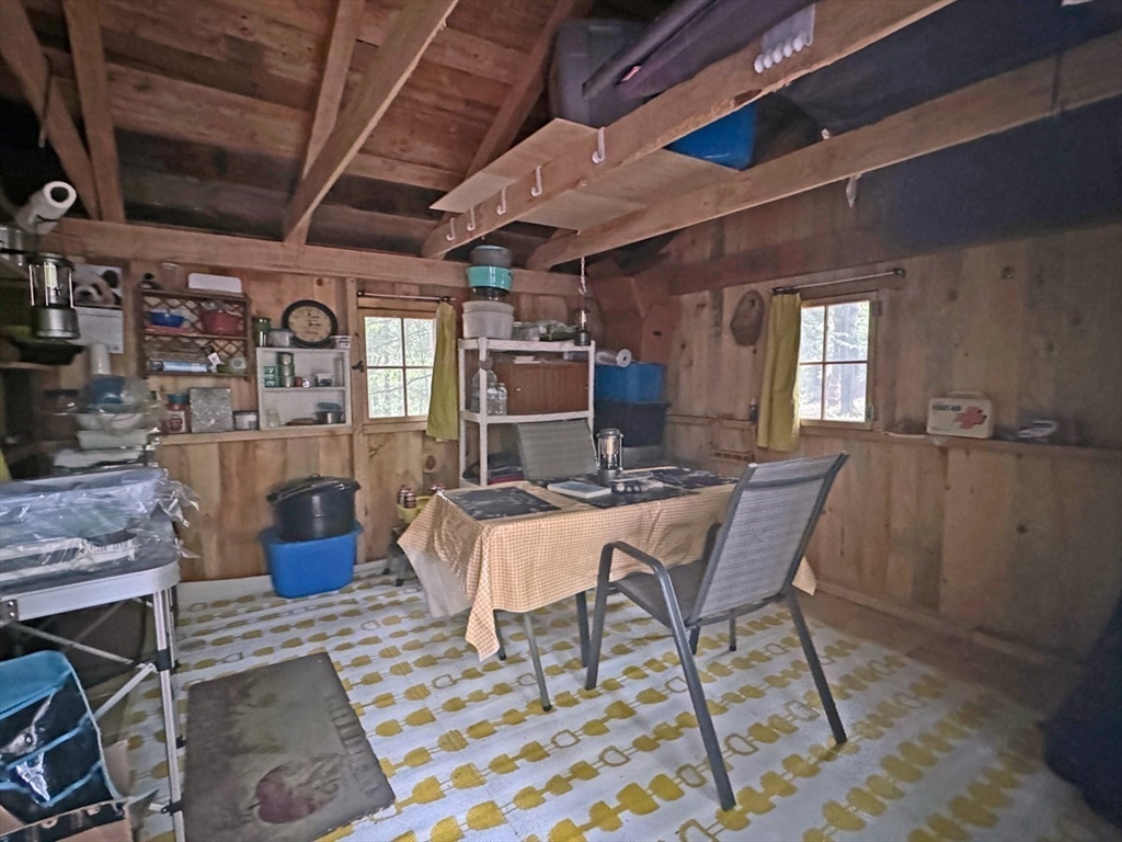 60 Stone Hill Road Rowe, MA 01367 - Photo 20 of 28 a view of a dining room with furniture