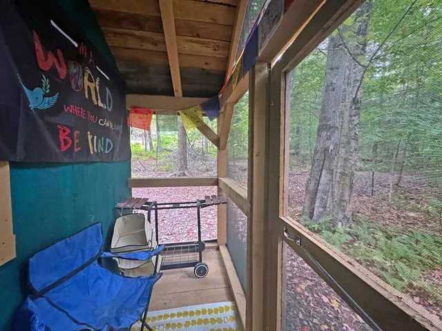 a balcony with chairs