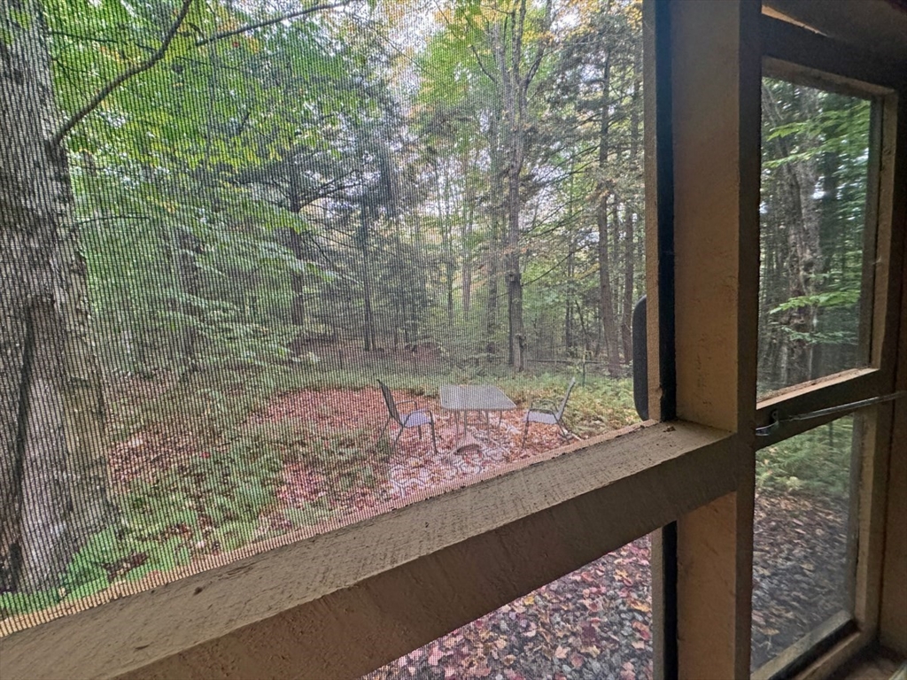 60 Stone Hill Road Rowe, MA 01367 - Photo 24 of 28 a view of a garden from a window