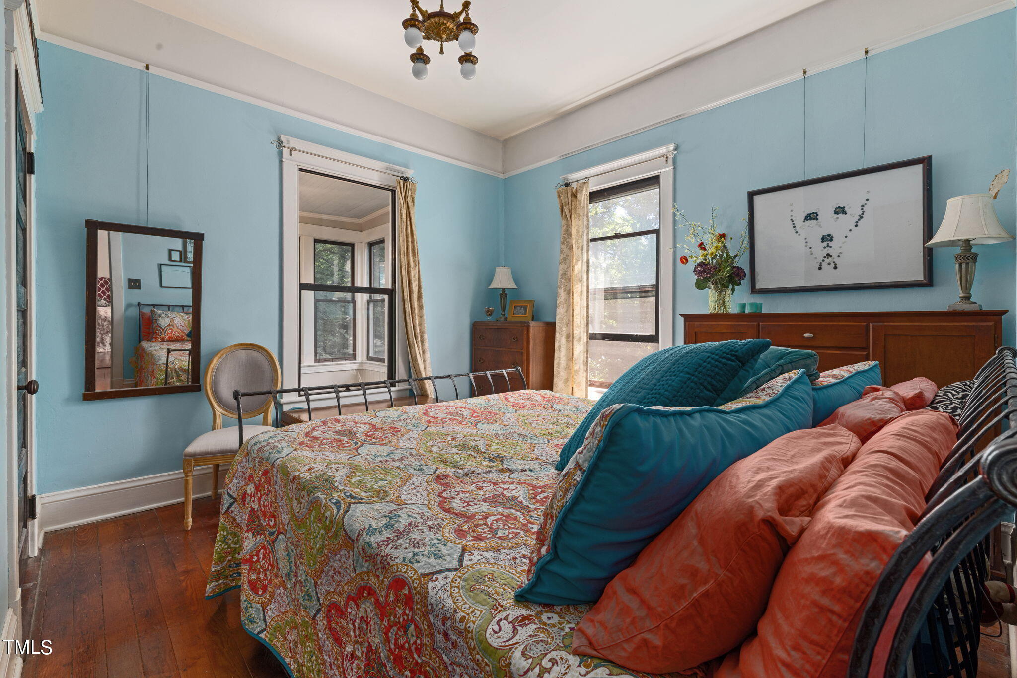 601 East Lane Street Raleigh, NC 27601 - Photo 15 of 34 a bedroom with a bed and window