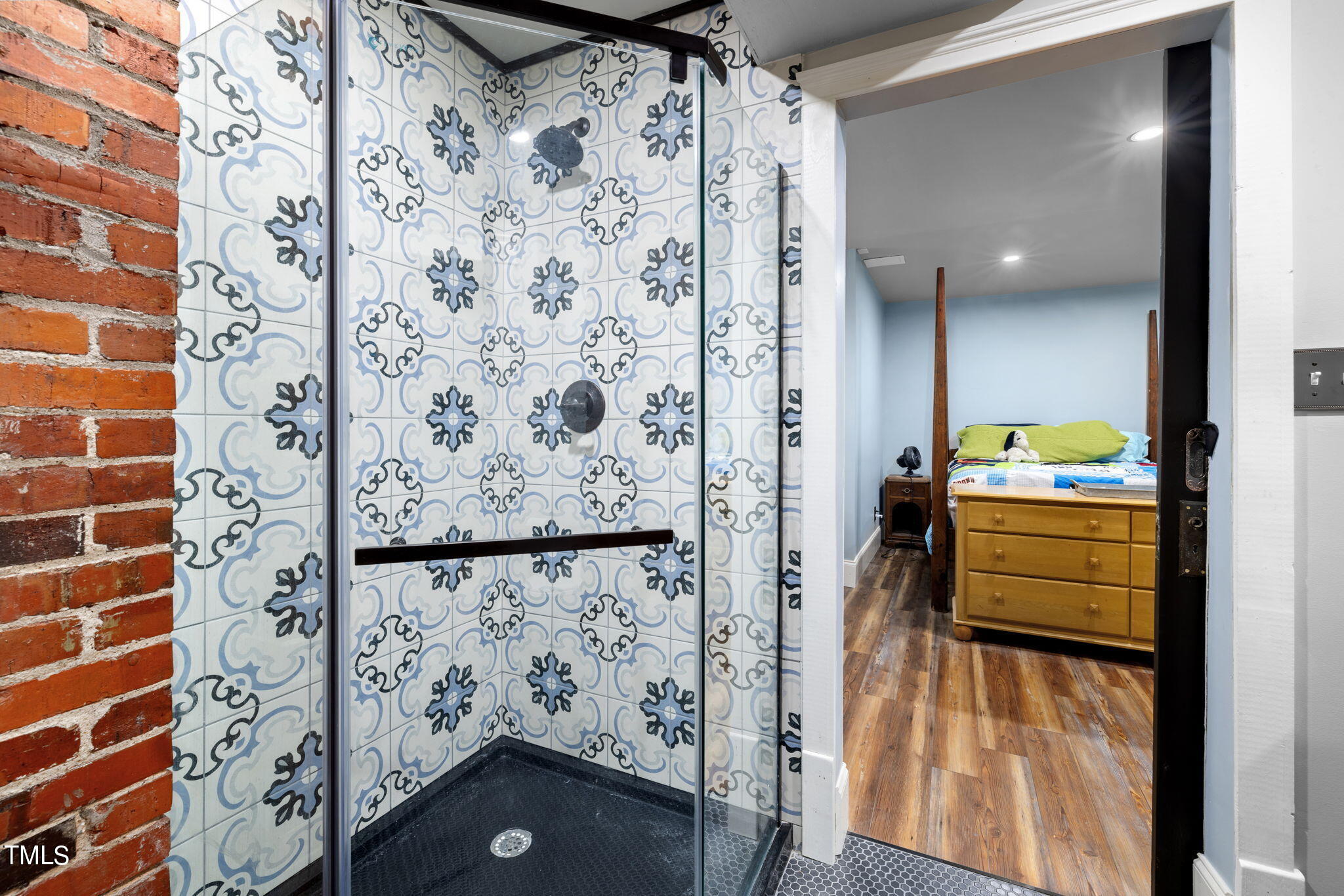 601 East Lane Street Raleigh, NC 27601 - Photo 27 of 34 a bathroom with a sink and a shower curtain