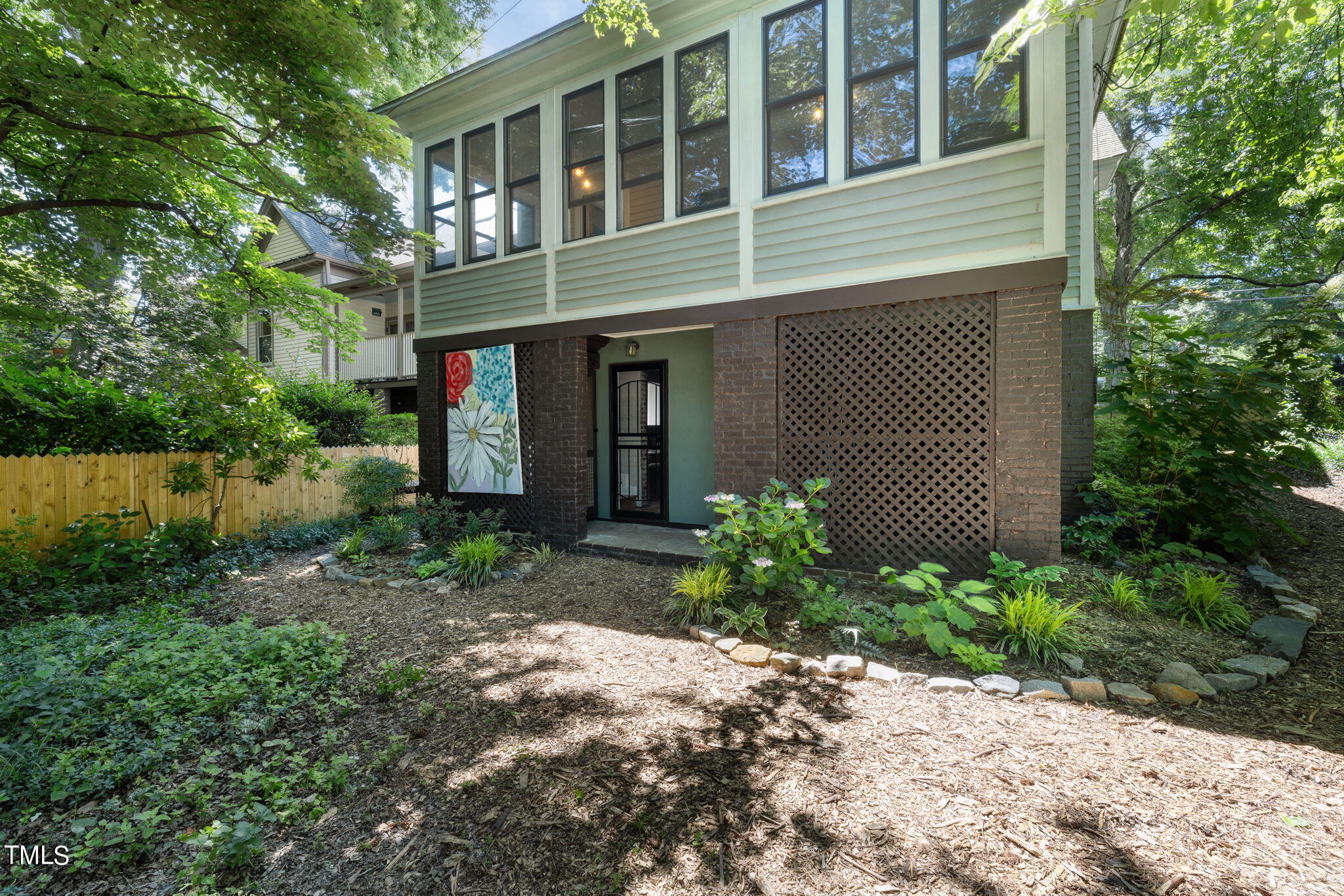 601 East Lane Street Raleigh, NC 27601 - Photo 30 of 34 a view of a house with a yard and sitting area