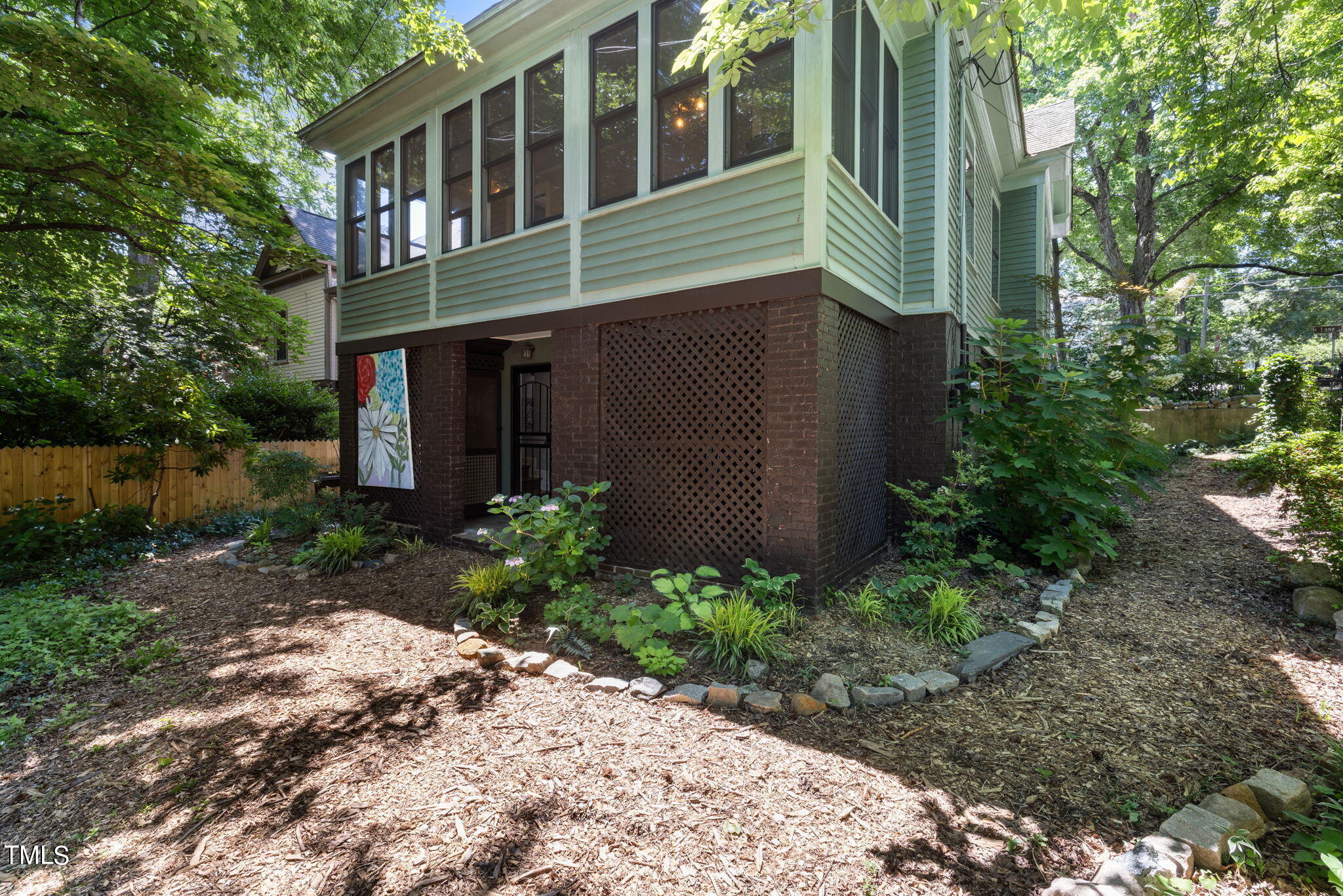 601 East Lane Street Raleigh, NC 27601 - Photo 31 of 34 a backyard of a house with lots of green space