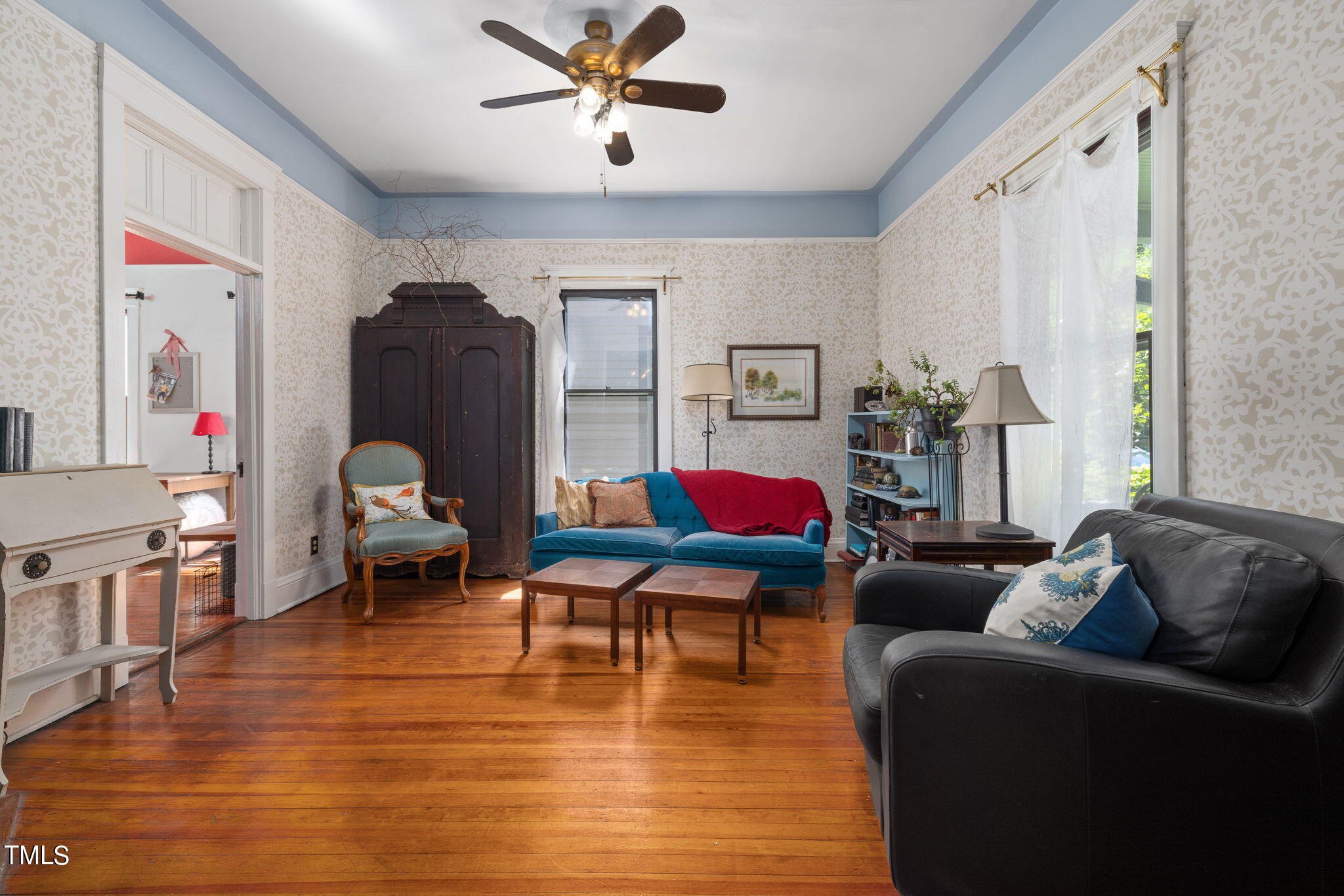 601 East Lane Street Raleigh, NC 27601 - Photo 5 of 34 a living room with furniture and a wooden floor