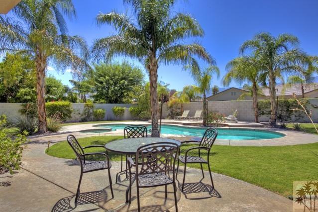 5 Champagne Circle Rancho Mirage, CA 92270 - Photo 17 of 24 a view of an outdoor sitting area with chairs and table