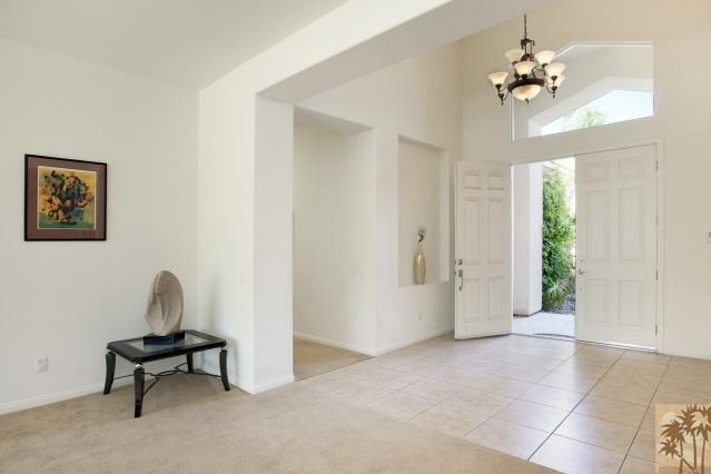 5 Champagne Circle Rancho Mirage, CA 92270 - Photo 5 of 24 a view of a livingroom with a workspace